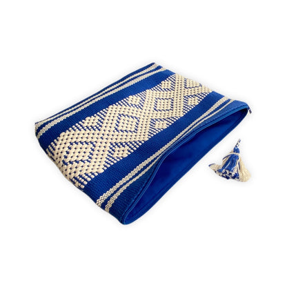 Handwoven cosmetic bag in royal blue and crisp white hues
