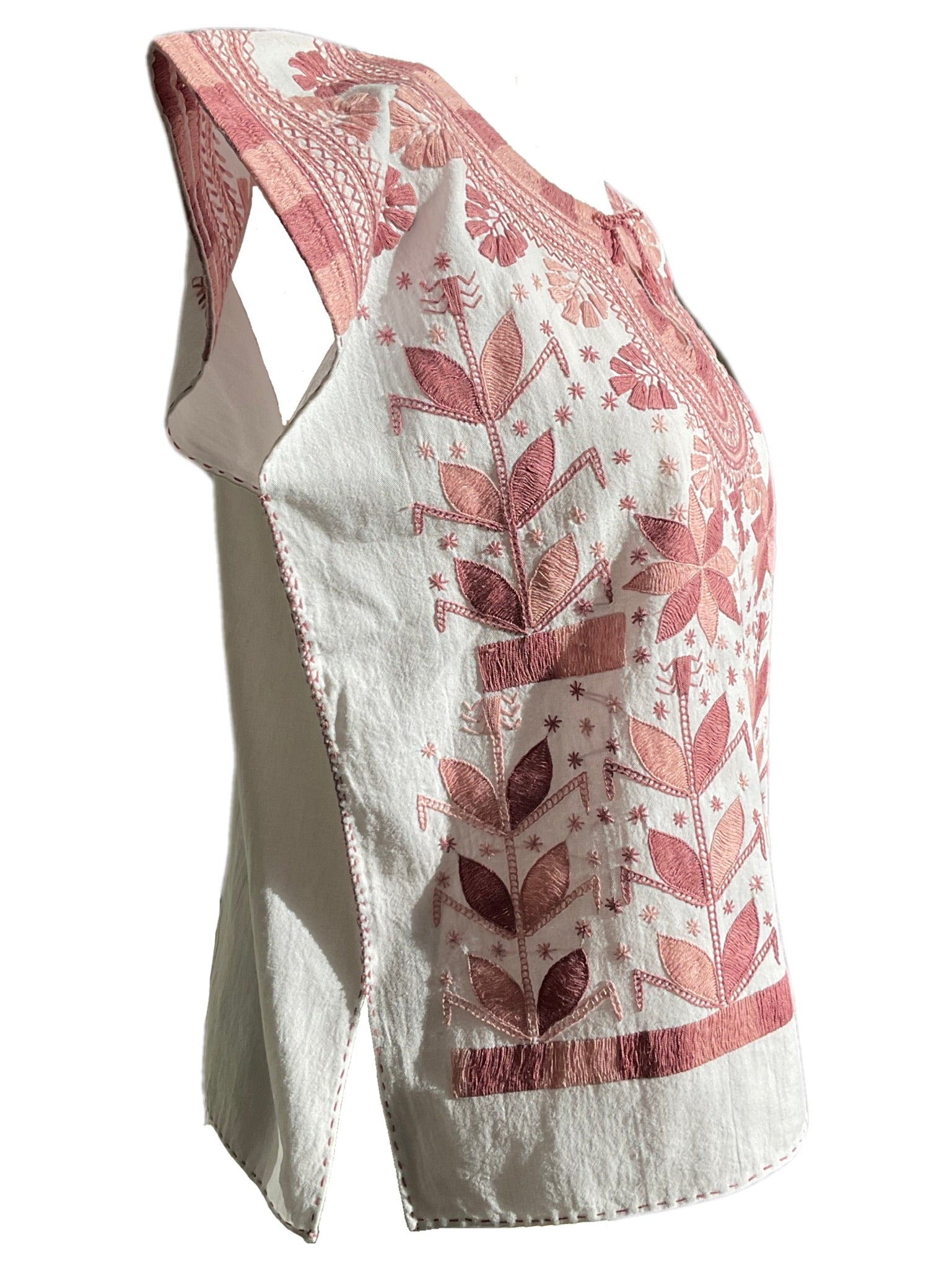 Hand embroidered blouse in dusty pink tones left side view