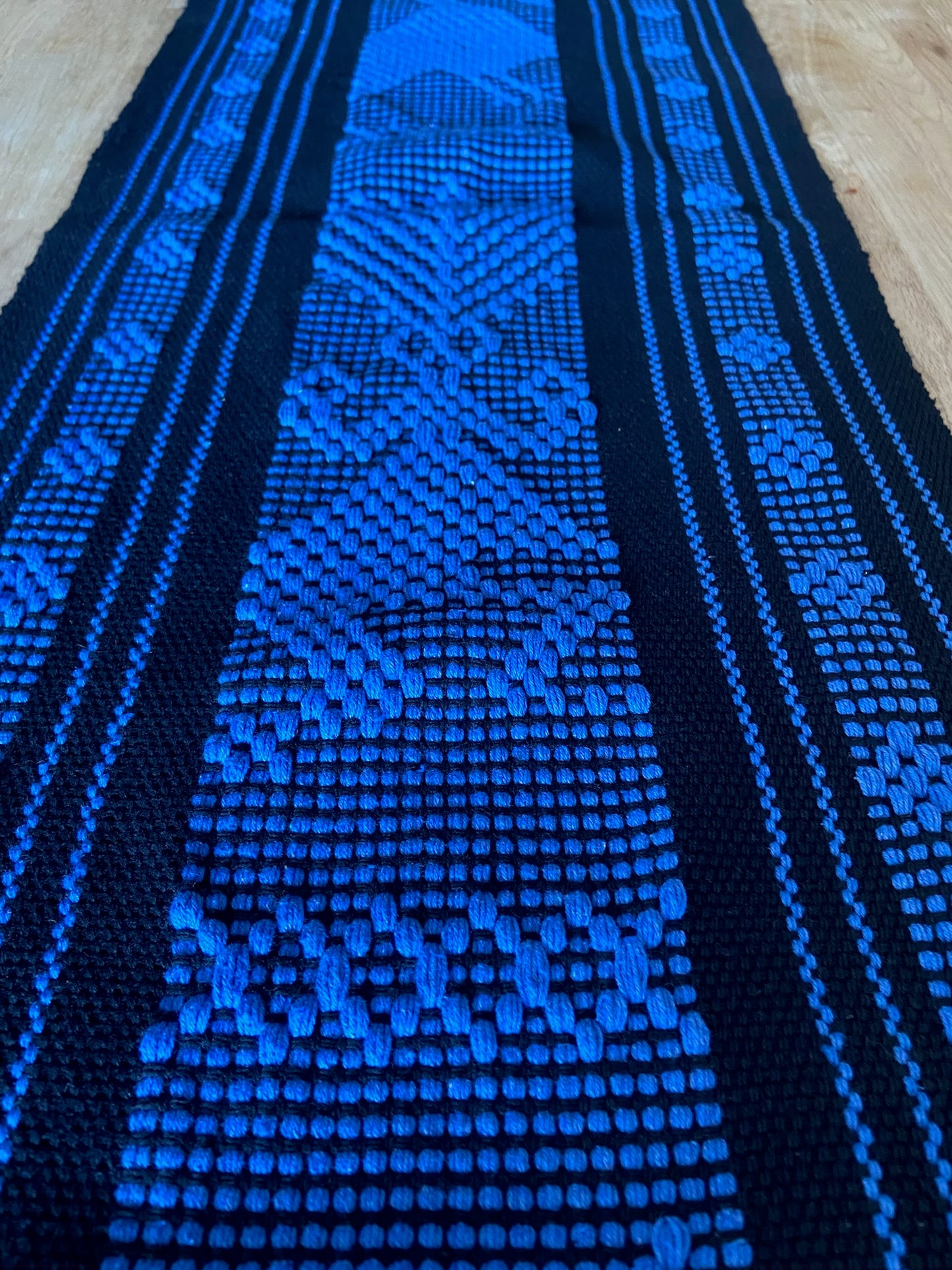 Set of hand woven table runner and 8 placemats in black and royal blue